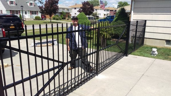 Beejay Security Door Technician at Installation of Custom Steel Driveway Gate