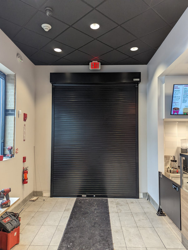 rolling gate installed within business